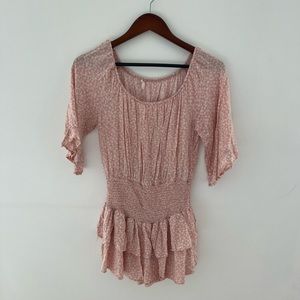 Pink and white floral romper